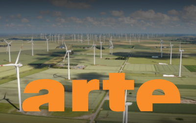 ARTE-Logo auf Windräderhintergrund, der die Energiewende symbolisiert.
