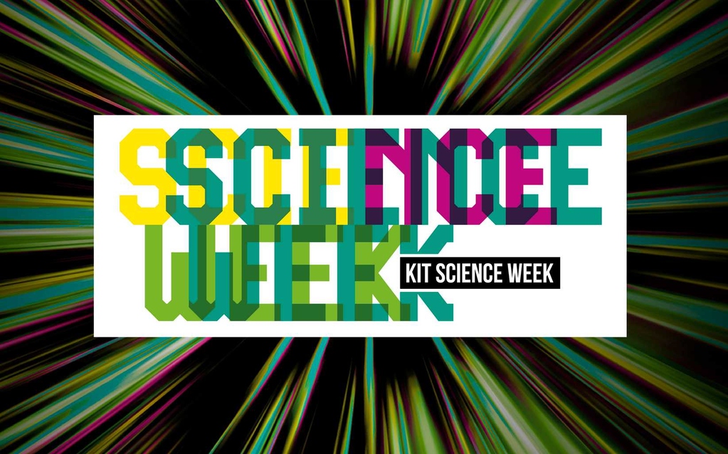 KIT Science Week in bunten Buchstaben in einem weißen Rechteck auf einem strahlenförmigen schwarz-grünen Hintergrund